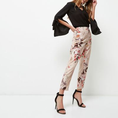Pink floral print tapered trousers